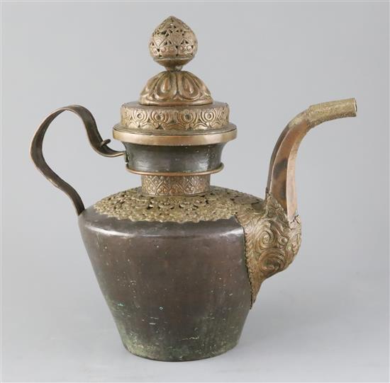 A Himalayan copper and repousse work teapot and cover, 19th century, H.34cm